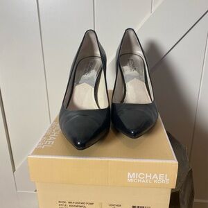 Black Michael kors black pumps. Excellent condition!